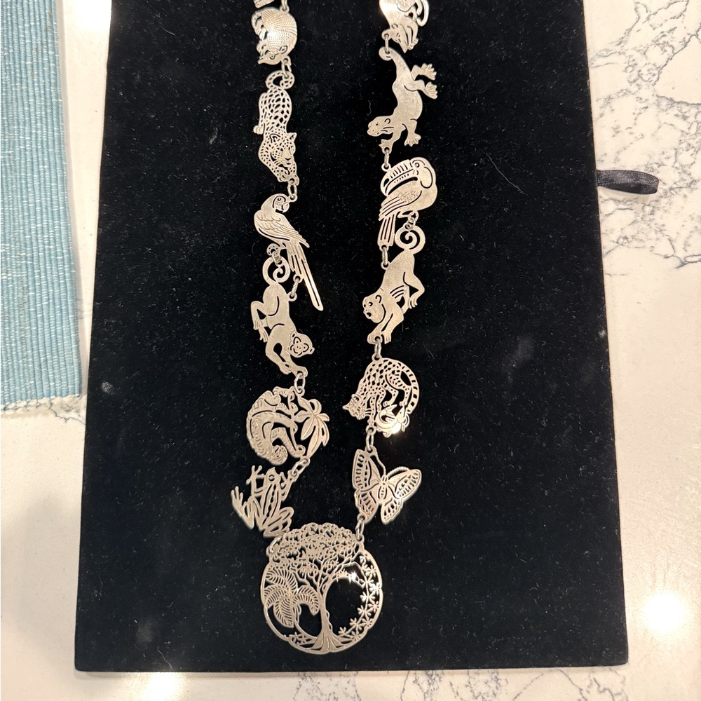 Vintage silver plate animal 13” necklace. GUC